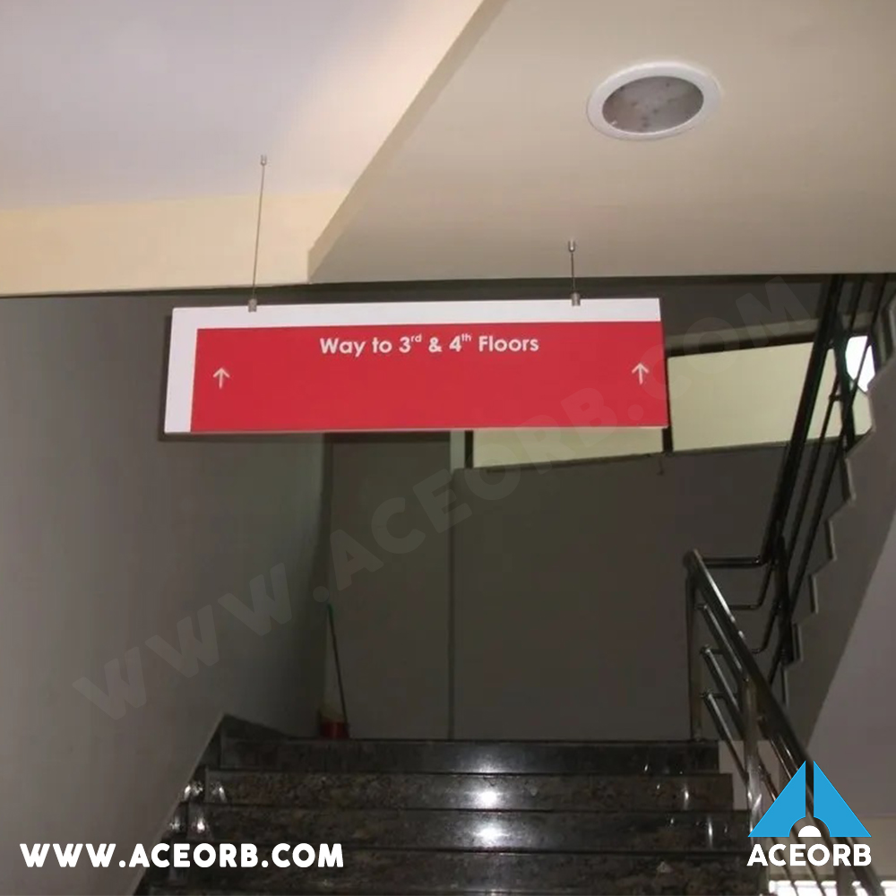 Suspended directional signage